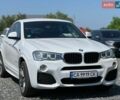 Белый БМВ Х4, объемом двигателя 2 л и пробегом 116 тыс. км за 25999 $, фото 1 на Automoto.ua