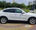 Белый БМВ Х4, объемом двигателя 2 л и пробегом 155 тыс. км за 23700 $, фото 1 на Automoto.ua