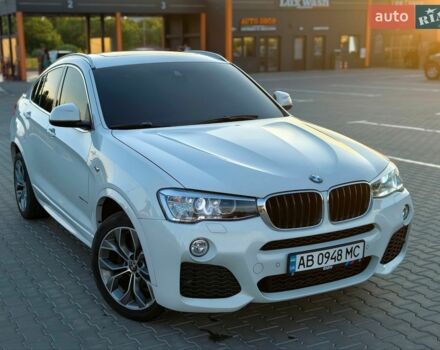 Белый БМВ Х4, объемом двигателя 2 л и пробегом 105 тыс. км за 25900 $, фото 2 на Automoto.ua