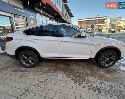 Белый БМВ Х4, объемом двигателя 2 л и пробегом 91 тыс. км за 27900 $, фото 4 на Automoto.ua