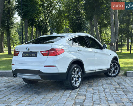 Белый БМВ Х4, объемом двигателя 2 л и пробегом 63 тыс. км за 27700 $, фото 24 на Automoto.ua