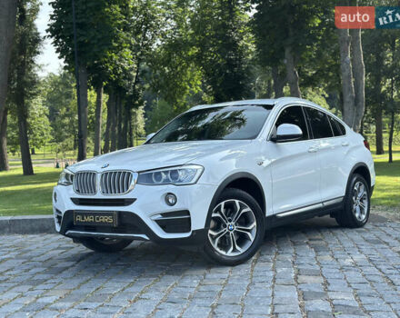 Белый БМВ Х4, объемом двигателя 2 л и пробегом 63 тыс. км за 27700 $, фото 1 на Automoto.ua