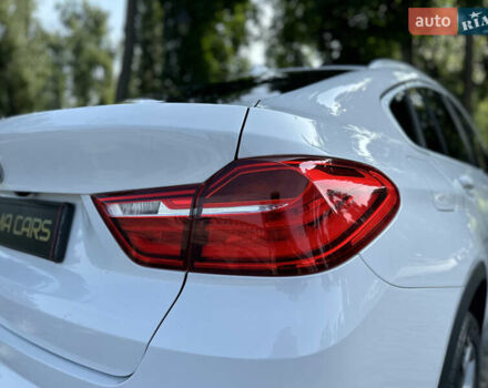 Белый БМВ Х4, объемом двигателя 2 л и пробегом 63 тыс. км за 27700 $, фото 27 на Automoto.ua