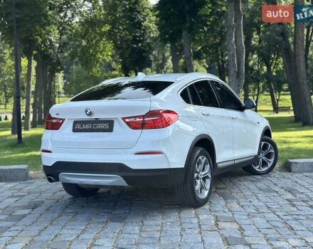 Белый БМВ Х4, объемом двигателя 2 л и пробегом 63 тыс. км за 27700 $, фото 25 на Automoto.ua