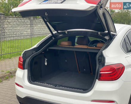 Белый БМВ Х4, объемом двигателя 2 л и пробегом 115 тыс. км за 21900 $, фото 7 на Automoto.ua