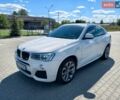 Белый БМВ Х4, объемом двигателя 2 л и пробегом 105 тыс. км за 25900 $, фото 1 на Automoto.ua