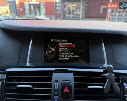 Белый БМВ Х4, объемом двигателя 2 л и пробегом 91 тыс. км за 27900 $, фото 23 на Automoto.ua