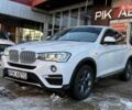 Белый БМВ Х4, объемом двигателя 2 л и пробегом 91 тыс. км за 27900 $, фото 1 на Automoto.ua