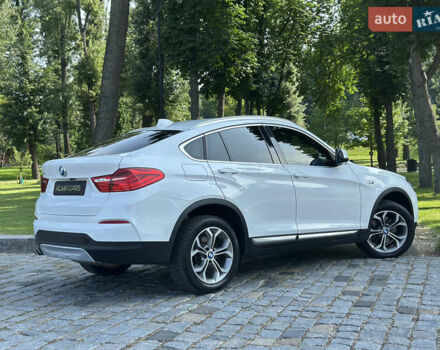 Белый БМВ Х4, объемом двигателя 2 л и пробегом 63 тыс. км за 27700 $, фото 22 на Automoto.ua