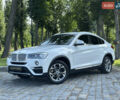 Белый БМВ Х4, объемом двигателя 2 л и пробегом 63 тыс. км за 27700 $, фото 1 на Automoto.ua