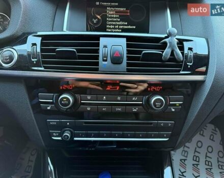 Белый БМВ Х4, объемом двигателя 2 л и пробегом 91 тыс. км за 27900 $, фото 24 на Automoto.ua