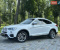 Белый БМВ Х4, объемом двигателя 2 л и пробегом 63 тыс. км за 27700 $, фото 3 на Automoto.ua