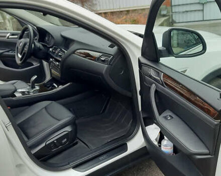 Белый БМВ Х4, объемом двигателя 2 л и пробегом 165 тыс. км за 26500 $, фото 26 на Automoto.ua