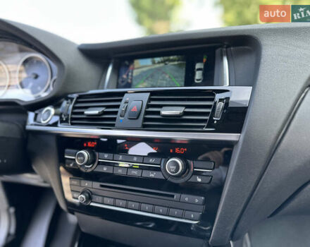 Белый БМВ Х4, объемом двигателя 2 л и пробегом 63 тыс. км за 27700 $, фото 69 на Automoto.ua