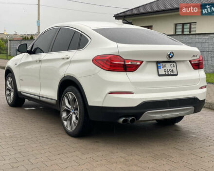 БМВ Х4 2016 у Києві на Automoto.ua Білий БМВ Х4, об'ємом двигуна 2 л та пробігом 114 тис. км за 23800 $, фото 4 на Automoto.ua