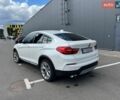 Белый БМВ Х4, объемом двигателя 2 л и пробегом 105 тыс. км за 16700 $, фото 1 на Automoto.ua