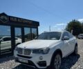 Белый БМВ Х4, объемом двигателя 2 л и пробегом 98 тыс. км за 16900 $, фото 1 на Automoto.ua