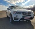 Белый БМВ Х4, объемом двигателя 2 л и пробегом 95 тыс. км за 20900 $, фото 1 на Automoto.ua
