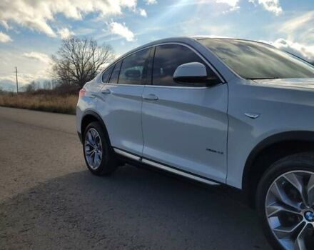 Белый БМВ Х4, объемом двигателя 2 л и пробегом 95 тыс. км за 20900 $, фото 7 на Automoto.ua