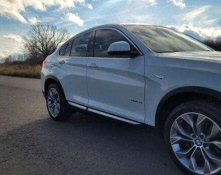 Белый БМВ Х4, объемом двигателя 2 л и пробегом 95 тыс. км за 20900 $, фото 6 на Automoto.ua