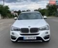 Белый БМВ Х4, объемом двигателя 2 л и пробегом 125 тыс. км за 16900 $, фото 1 на Automoto.ua