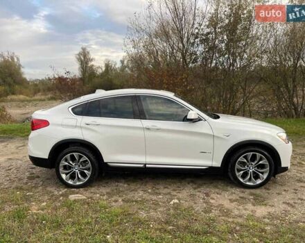Белый БМВ Х4, объемом двигателя 2 л и пробегом 122 тыс. км за 19900 $, фото 1 на Automoto.ua