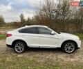 Белый БМВ Х4, объемом двигателя 2 л и пробегом 122 тыс. км за 19900 $, фото 1 на Automoto.ua