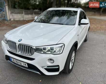 Белый БМВ Х4, объемом двигателя 2 л и пробегом 170 тыс. км за 33800 $, фото 7 на Automoto.ua