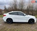 Белый БМВ Х4, объемом двигателя 2 л и пробегом 158 тыс. км за 19900 $, фото 1 на Automoto.ua