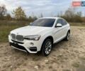 Белый БМВ Х4, объемом двигателя 2 л и пробегом 122 тыс. км за 19900 $, фото 1 на Automoto.ua