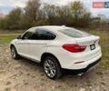 Белый БМВ Х4, объемом двигателя 2 л и пробегом 122 тыс. км за 19900 $, фото 4 на Automoto.ua