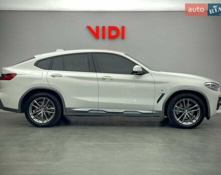 Білий БМВ Х4, об'ємом двигуна 2 л та пробігом 112 тис. км за 38579 $, фото 2 на Automoto.ua