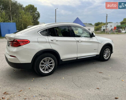Белый БМВ Х4, объемом двигателя 2 л и пробегом 170 тыс. км за 33800 $, фото 4 на Automoto.ua