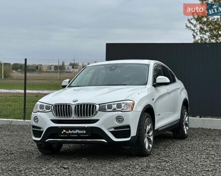 Белый БМВ Х4, объемом двигателя 2 л и пробегом 117 тыс. км за 21200 $, фото 1 на Automoto.ua
