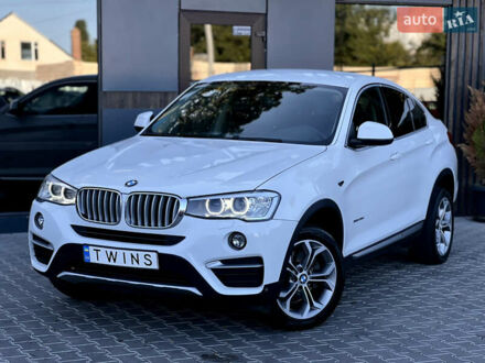 Белый БМВ Х4, объемом двигателя 2 л и пробегом 165 тыс. км за 22900 $, фото 1 на Automoto.ua