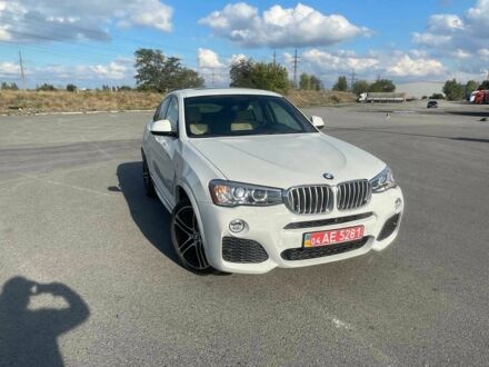 Белый БМВ Х4, объемом двигателя 2 л и пробегом 131 тыс. км за 22500 $, фото 1 на Automoto.ua