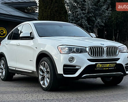 Белый БМВ Х4, объемом двигателя 2 л и пробегом 95 тыс. км за 19750 $, фото 1 на Automoto.ua