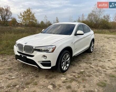Белый БМВ Х4, объемом двигателя 2 л и пробегом 122 тыс. км за 19900 $, фото 1 на Automoto.ua
