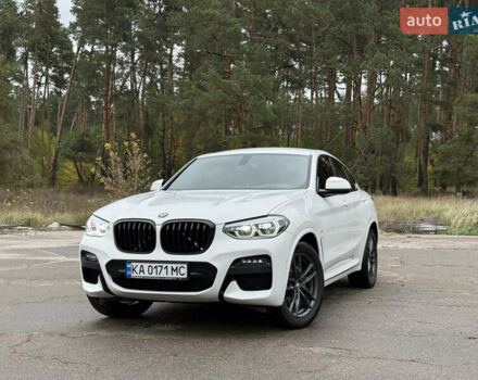 Белый БМВ Х4, объемом двигателя 2 л и пробегом 77 тыс. км за 44800 $, фото 1 на Automoto.ua