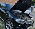 Чорний БМВ Х4, об'ємом двигуна 2 л та пробігом 150 тис. км за 17948 $, фото 1 на Automoto.ua