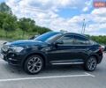 Черный БМВ Х4, объемом двигателя 2 л и пробегом 132 тыс. км за 23000 $, фото 1 на Automoto.ua