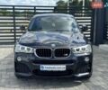 Черный БМВ Х4, объемом двигателя 2 л и пробегом 217 тыс. км за 26500 $, фото 1 на Automoto.ua