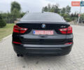 Чорний БМВ Х4, об'ємом двигуна 2 л та пробігом 258 тис. км за 15999 $, фото 6 на Automoto.ua