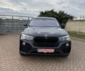 Чорний БМВ Х4, об'ємом двигуна 2 л та пробігом 230 тис. км за 20900 $, фото 1 на Automoto.ua