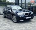 Черный БМВ Х4, объемом двигателя 2 л и пробегом 217 тыс. км за 26500 $, фото 1 на Automoto.ua