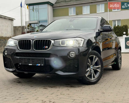 Черный БМВ Х4, объемом двигателя 2 л и пробегом 215 тыс. км за 26999 $, фото 1 на Automoto.ua
