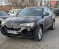 Черный БМВ Х4, объемом двигателя 2 л и пробегом 95 тыс. км за 20850 $, фото 1 на Automoto.ua