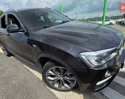 Черный БМВ Х4, объемом двигателя 2 л и пробегом 187 тыс. км за 24900 $, фото 1 на Automoto.ua