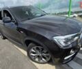 Черный БМВ Х4, объемом двигателя 2 л и пробегом 187 тыс. км за 24900 $, фото 1 на Automoto.ua