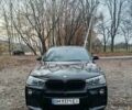 Черный БМВ Х4, объемом двигателя 2 л и пробегом 140 тыс. км за 20500 $, фото 1 на Automoto.ua
